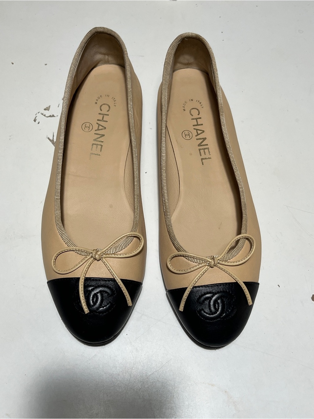 CHANEL Beige and Black Cap-Toe Leather Ballet Flats with Bow